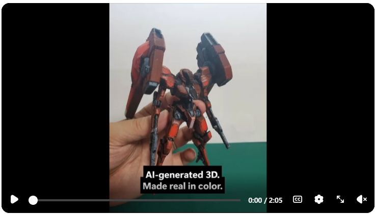A real red and dark-coloured robot print held in a hand